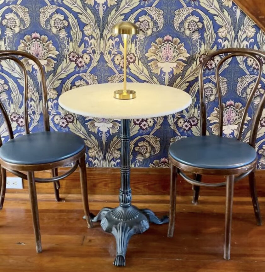 Bistro table and vintage wallpaper